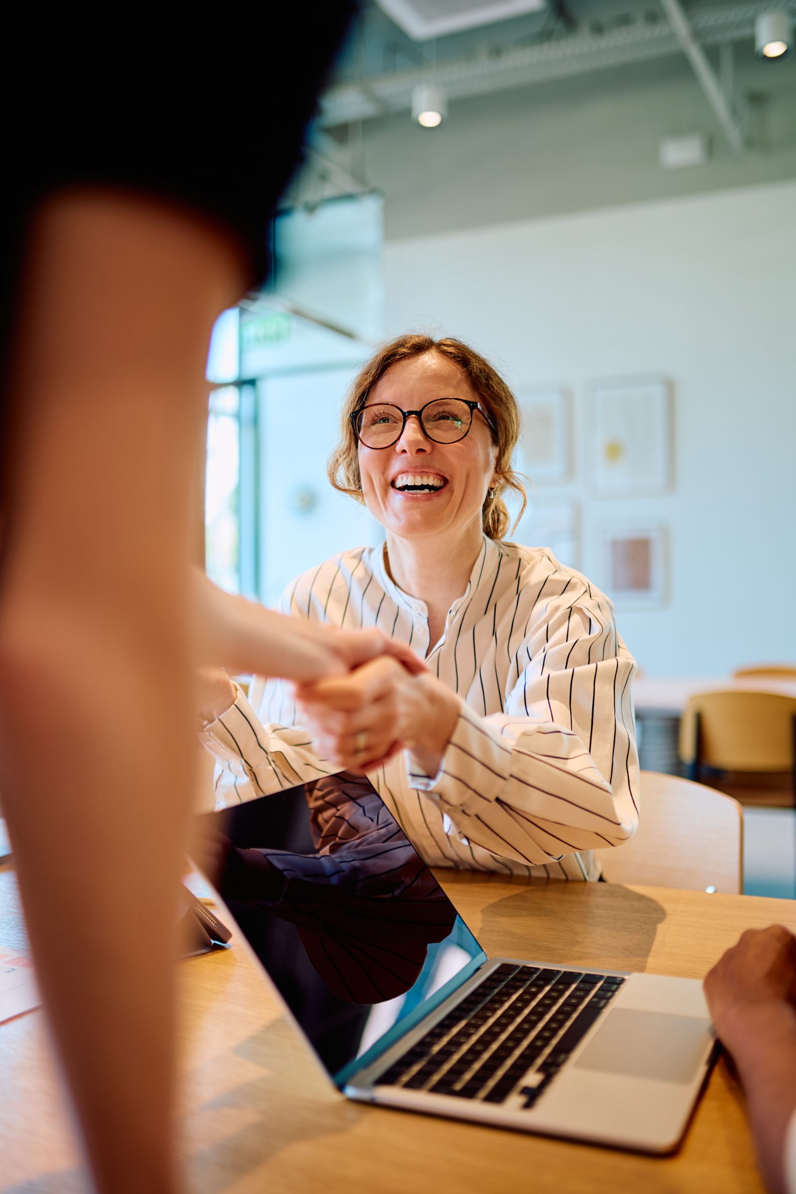 Two people handing over a parcel